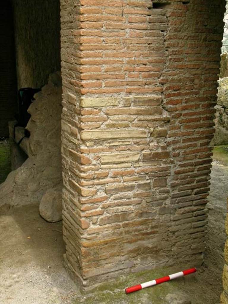 V 19, Herculaneum. May 2005. Looking towards north side of wall from shop-room,
With doorway to V.20, on right. Photo courtesy of Nicolas Monteix.